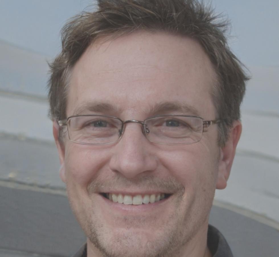 Oleksandr Hrynko working at audio production desk